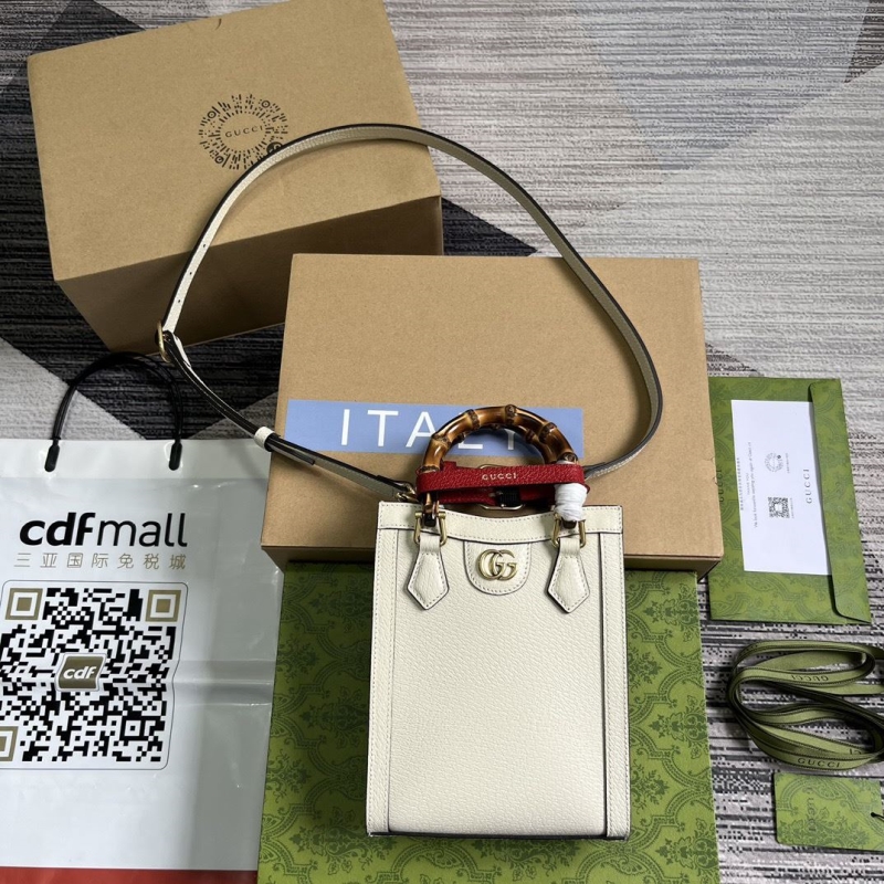 G*u*i top handle bags